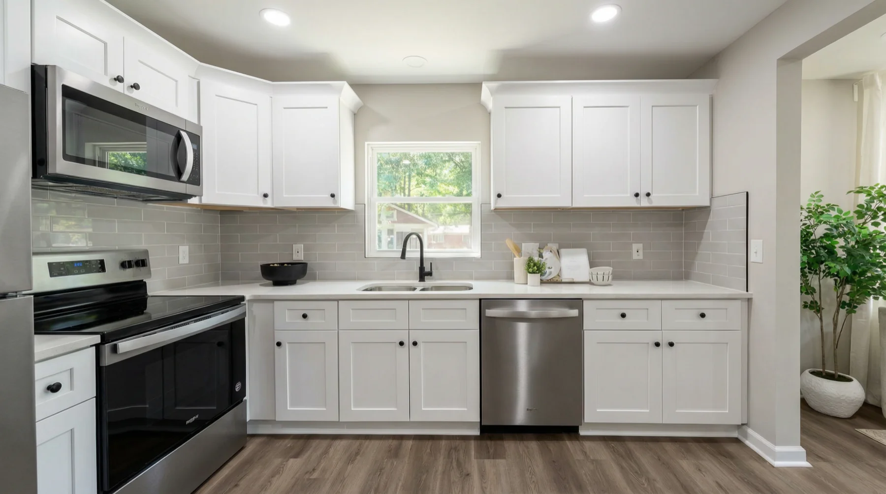 White Kitchen with Gray Backsplash