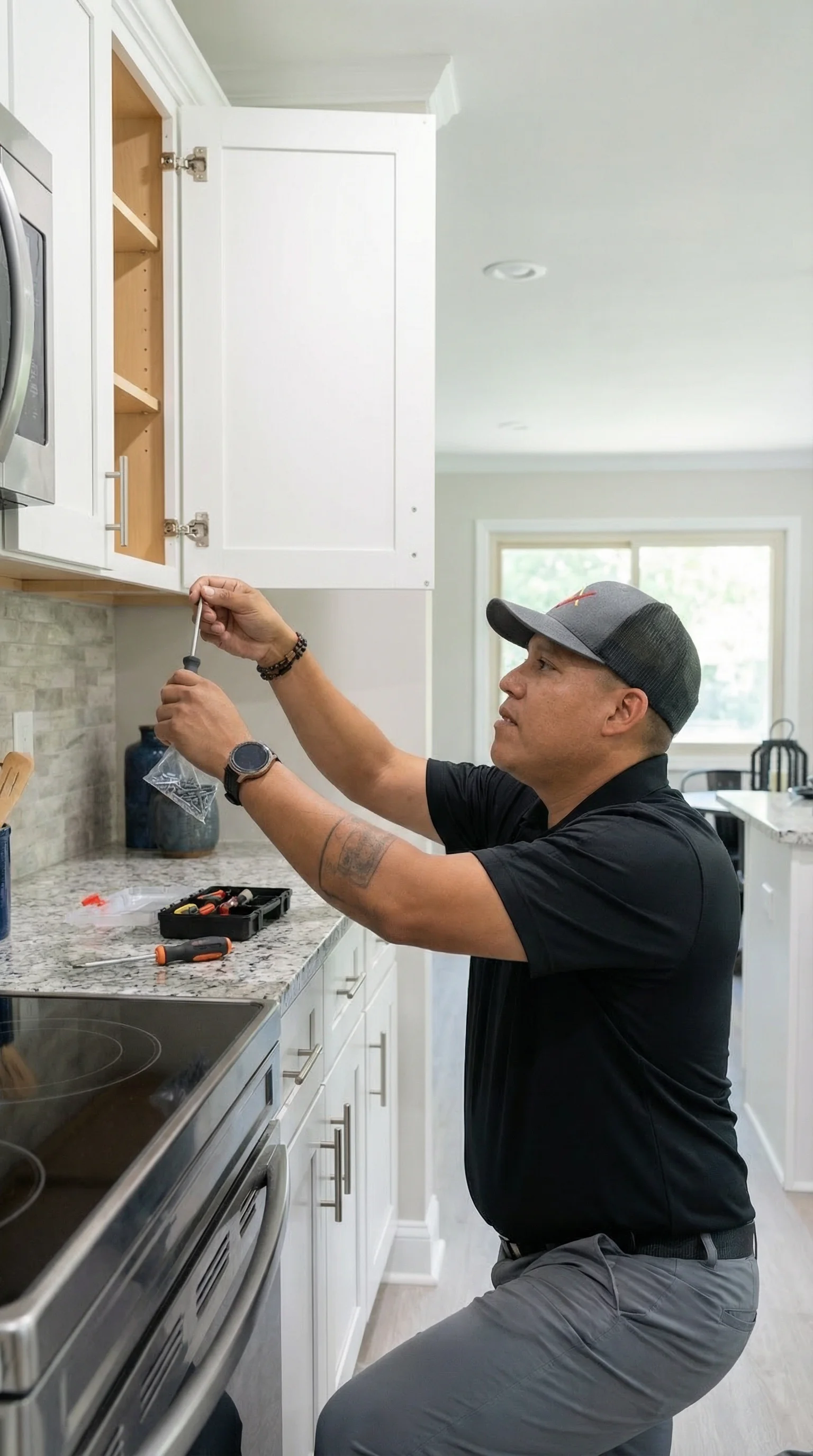 Technician Installing Cabinet Hinge