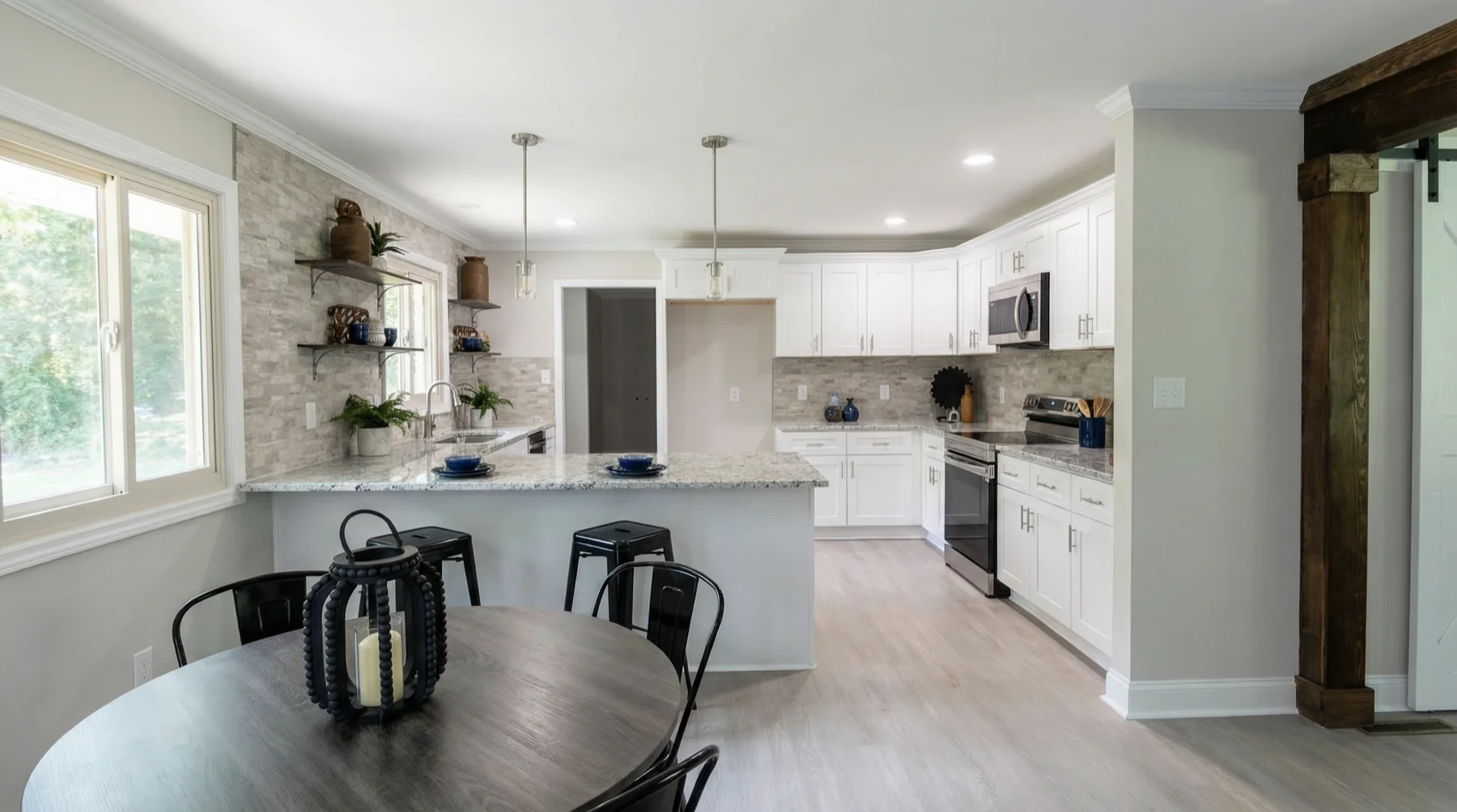 White Kitchen with Stone Accent Wall