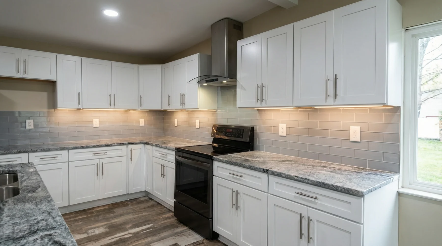 White Kitchen with Granite and Subway Tile