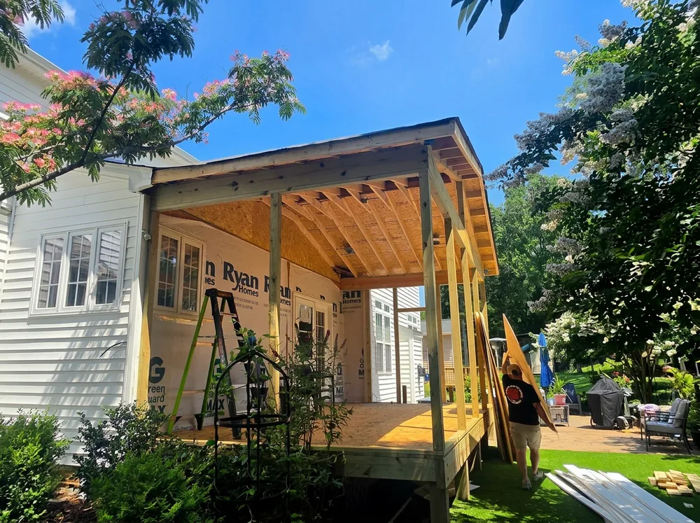 iFIXX crew rebuilding a deck and porch structure in South Charlotte