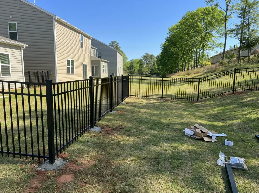 Black aluminum fence along a South Charlotte yard
